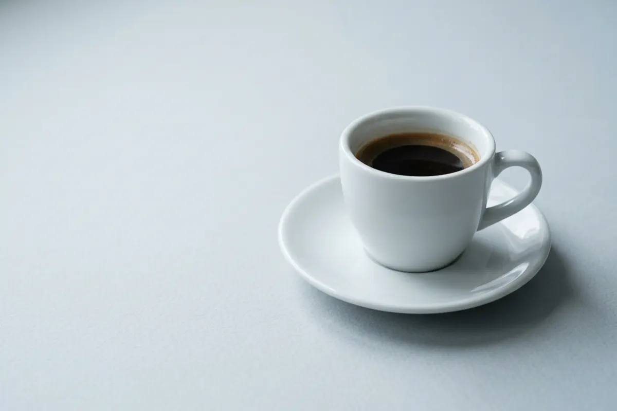 An espresso cup on a saucer